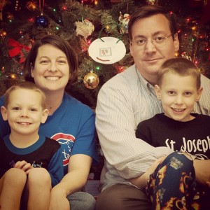 Our Awkward Christmas Photo...one with no pants, the other with a half hearted smile.  But still a great family. :)