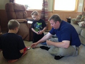 Boys playing Uno