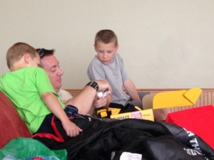 Getting his real present.  A drill or something....