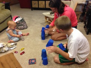 Teaching cup stacking.  I think Eleanor really got the hang of it!