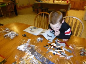 The moment they waited for all day...starting their lego sets.