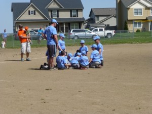 Post game team huddle.  It was a win!