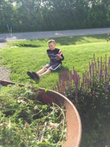 He pulled two weeds.  "Can I go get a drink and take a break?!"